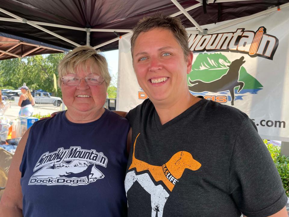 Kaye Noble, president of Smoky Mountain Dock Dogs, with Jennifer Belle of the Dog Wizard at Dog Daze VI held at Village Green Shopping Center in Farragut Saturday, Aug. 13, 2022.
