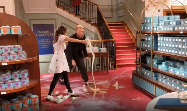 Les manifestants d'Animal Rebellion ont versé du lait sur le tapis de Fortnum & Mason à Londres (Animal Rebellion/PA)