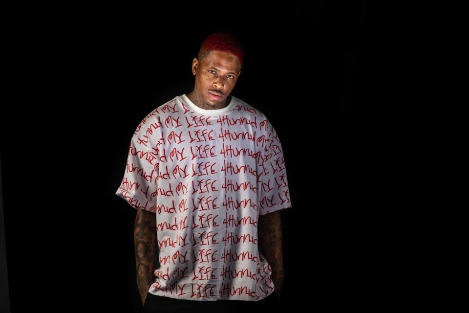 Rapper YG in a tee from his company in promotion of his new album, "My Life 4Hunnid."