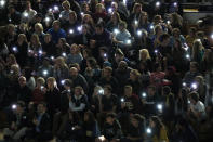 <p>Attendees illuminate their mobile telephones during a community vigil to mark the attack on the STEM Highlands Ranch school late Wednesday, May 8, 2019, in Highlands Ranch, Colo. (AP Photo/David Zalubowski) </p>