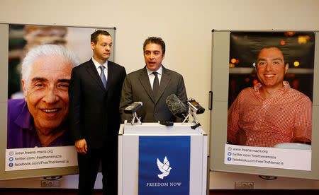 Lawyer Jared Genser and Babak Namazi, the brother and son of two prisoners in Iran, who hold both U.S. American and Iranian citizenship and who have been sentenced to lengthy prison terms in Iran, address the media in Vienna, Austria, April 25, 2017. REUTERS/Leonhard Foeger