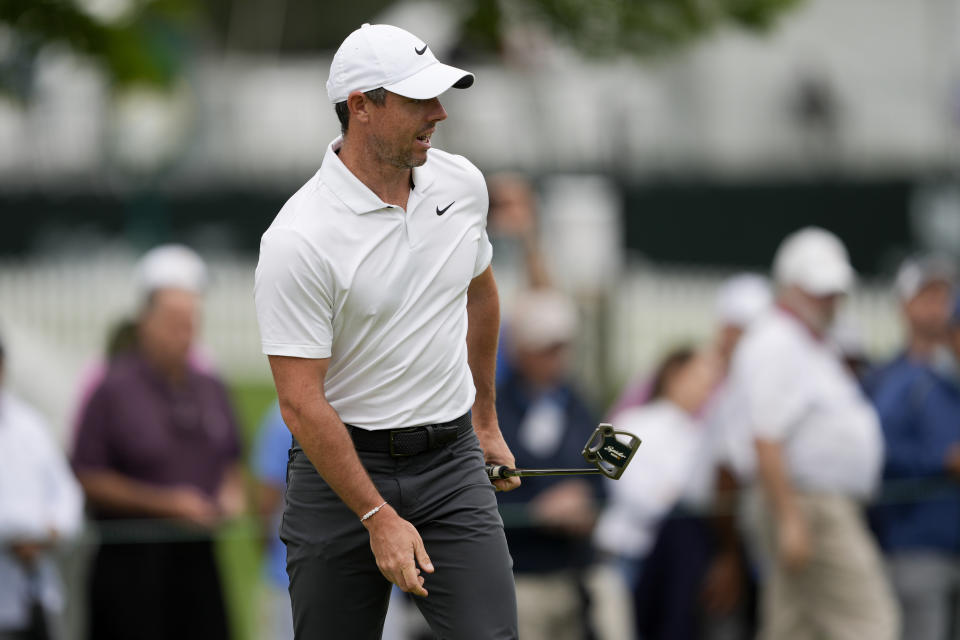 Rory McIlroy, of Northern Ireland, reacts after missing a putt on the second hole during first round of the Wells Fargo Championship golf tournament at the Quail Hollow Club Thursday, May 9, 2024, in Charlotte, N.C. (AP Photo/Chris Carlson)