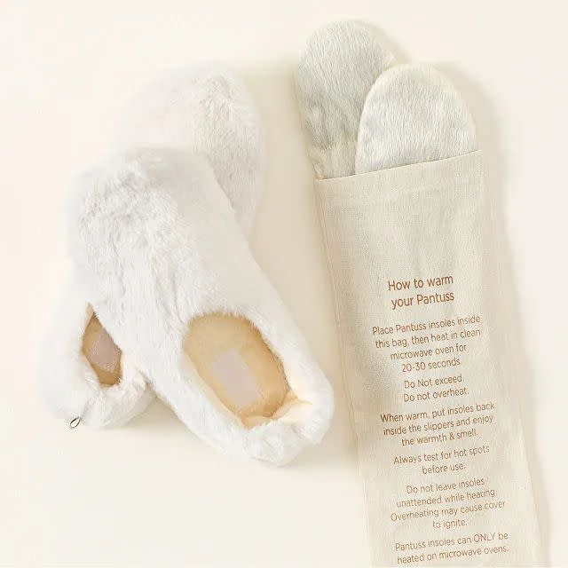 <p><a href="https://go.redirectingat.com?id=74968X1596630&url=https%3A%2F%2Fwww.uncommongoods.com%2Fproduct%2Fballerina-herbal-warming-slippers&sref=https%3A%2F%2Fwww.elledecor.com%2Fshopping%2Fg46078531%2Fwhite-elephant-gifts%2F" rel="nofollow noopener" target="_blank" data-ylk="slk:Shop Now;elm:context_link;itc:0;sec:content-canvas" class="link ">Shop Now</a></p><p>Ballerina Herbal Warming Slippers</p><p>uncommongoods.com</p><p>$48.00</p>