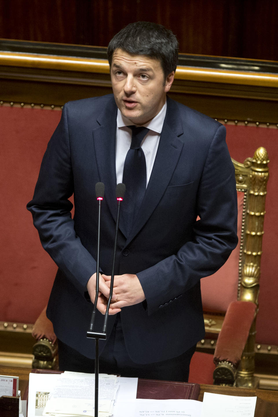 Premier Matteo Renzi delivers his speech prior to a confidence vote, at the Senate, in Rome, Monday, Feb. 24, 2014. Renzi, Italy's youngest premier, is heading a new government he says promises will swiftly tackle old problems.(AP Photo/Andrew Medichini)