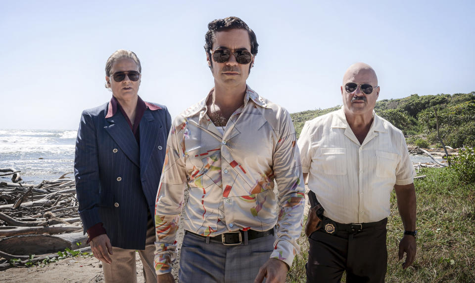 This image released by MGM+ shows Yul Vazquez, from left, Danny Pino and Michael Chiklis from "Hotel Cocaine." (Carlos Rodriguez/MGM+ via AP)