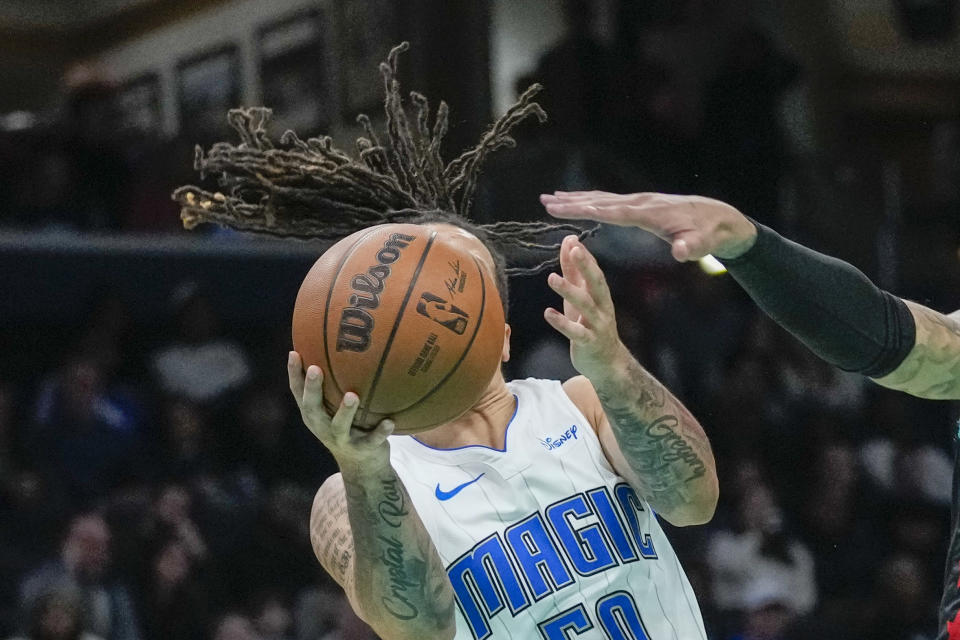 Orlando Magic guard Cole Anthony looks to shoot the ball during the second half of an NBA basketball game against the Washington Wizards, Tuesday, Dec. 26, 2023, in Washington. (AP Photo/Alex Brandon)