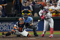 Atlanta Braves' Jorge Soler hits a three-run home run during the third inning in Game 6 of baseball's World Series between the Houston Astros and the Atlanta Braves Tuesday, Nov. 2, 2021, in Houston. (AP Photo/Sue Ogrocki)