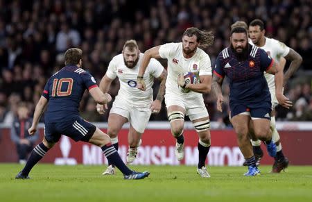 Britain Rugby Union - England v France - Six Nations Championship - Twickenham Stadium, London - 4/2/17 Tom Wood of England in action with Camille Lopez of France Action Images via Reuters / Henry Browne Livepic