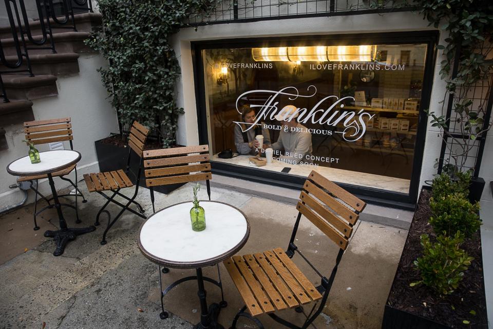 Cozy seating can be found inside and out of the newly open Franklin’s. (Richard Burkhart/Savannah Morning News)