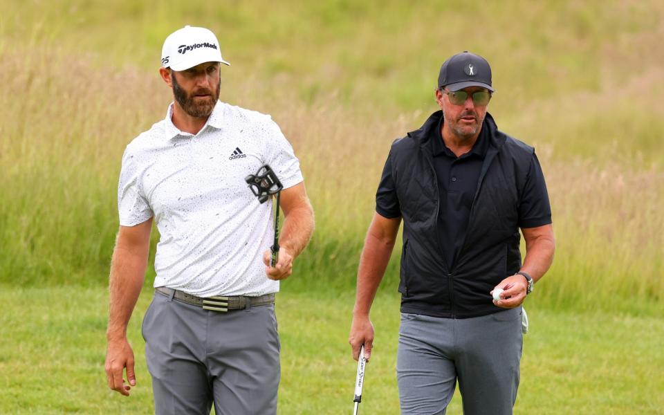 The two leading names Dustin Johnson and Phil Mickelson played together on the first day of the breakaway series  - GETTY IMAGES