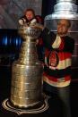 OTTAWA, ON - JANUARY 27: Jean Marc Gionet (R) holds his son Kaleo on the Stanley Cup during the NHL Fan Fair at the Ottawa Convention Centre on January 27, 2012 in Ottawa, Ontario, Canada. (Photo by Christian Petersen/Getty Images)