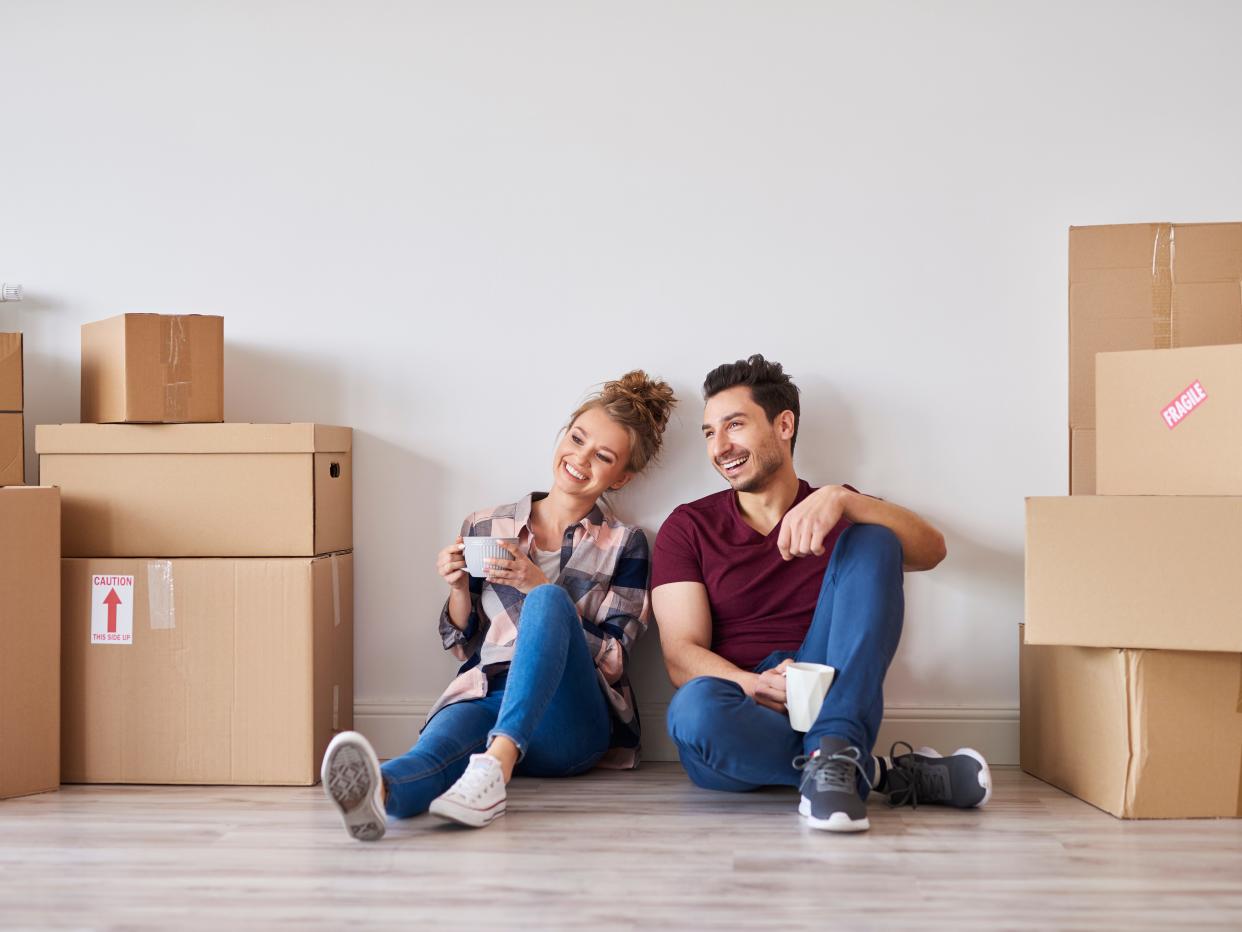 A young couple prepares to move.