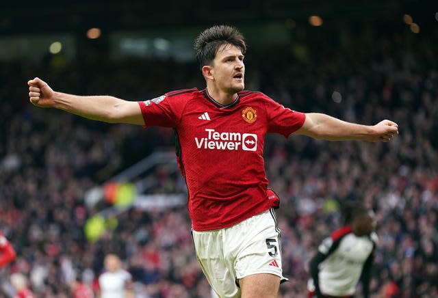 Harry Maguire celebrates scoring against Fulham