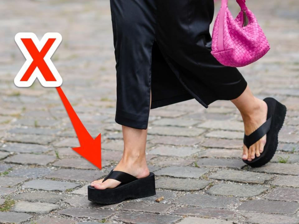 An X pointing at chunky flip-flops.