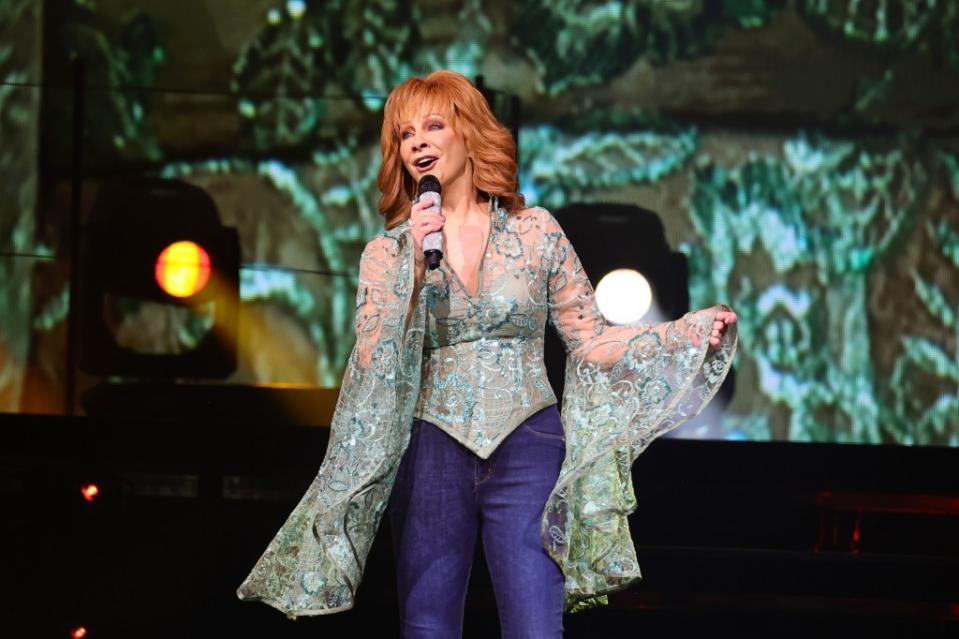 A post made by a Facebook group called America Loves Liberty claimed McEntire was “disappointed” with the way the “Bejeweled” singer acted during her performance. Theo Wargo/Getty Images