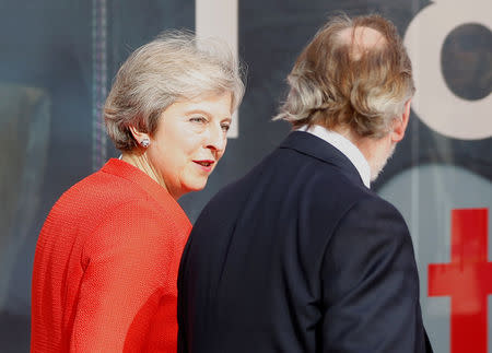 Britain's Prime Minister Theresa May and Britain's Permanent Representative to the EU Tim Barrow leave after a news conference after the informal meeting of European Union leaders in Salzburg, Austria, September 20, 2018. REUTERS/Leonhard Foeger