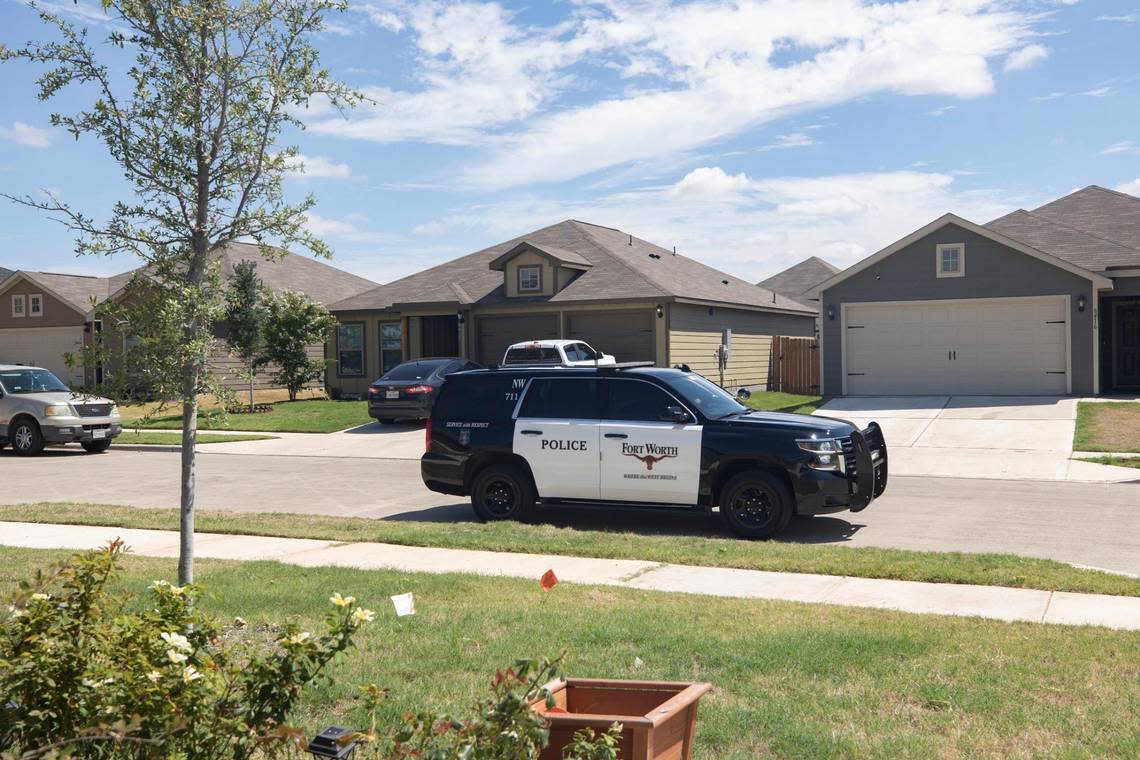 A police car drives through the neighborhood on Monday, August 29, 2022, where two children and a 17-year-old were shot the day before in the 8500 block of Steel Dust Drive. Neighbors say the presence of local law enforcement is unprecedented on the usually quiet street.