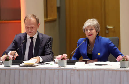 European Council President Donald Tusk and Britain's Prime Minister Theresa May attend an extraordinary European Union leaders summit to discuss Brexit, in Brussels, Belgium April 10, 2019. Olivier Hoslet/Pool via REUTERS