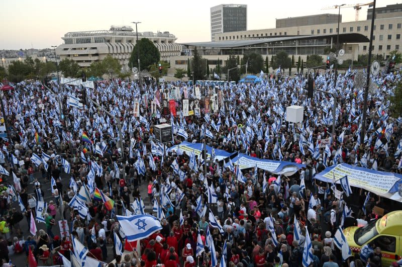 Tens of thousands of anti-judicial reform protesters chanting "democracy" gather in front of the Supreme Court in Jerusalem on Monday, one day before the High Court is set to hear a landmark case on the law limiting the reasonableness standard. The law prevents Israeli courts from weighing in on the reasonableness of government and ministerial decisions. Photo by Debbie Hill/UPI