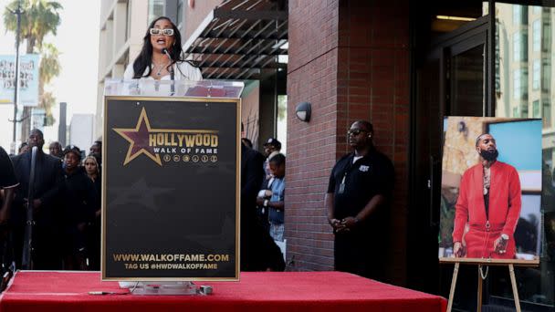 PHOTO: Lauren London, partner of late Nipsey Hussle, speaks during the unveiling of his star as he is honored posthumously on the Hollywood Walk of Fame in Los Angeles, Aug. 15, 2022. (Mario Anzuoni/Reuters)