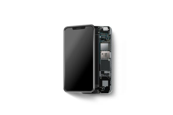 Modern smartphone with the case opened up to show some of the microchips inside.