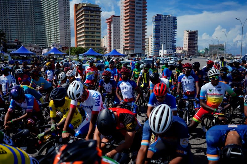 The Wider Image: Haiti's cyclists brave protests and poor roads in race for gold