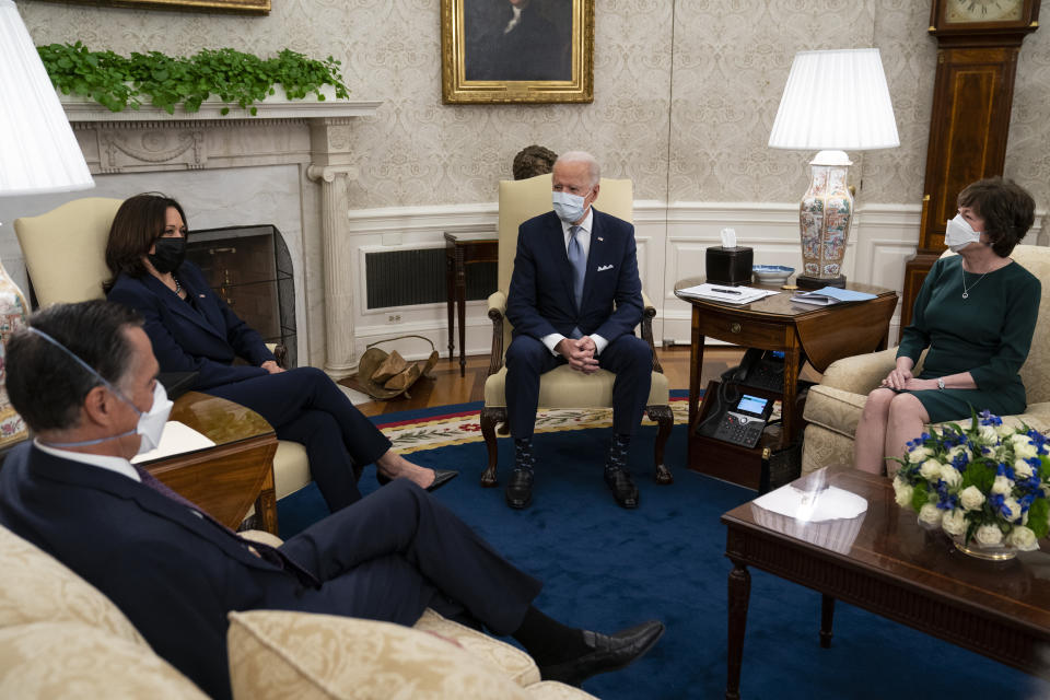 President Joe Biden and Vice President Kamala Harris meet with Republican lawmakers to discuss a coronavirus relief package in the Oval Office of the White House on Feb. 1. From left, Sen. Mitt Romney of Utah, Harris, Biden, and Sen. Susan Collins of Maine. (Photo: Evan Vucci/Associated Pres)