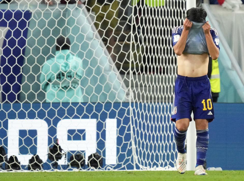 Minamino Takumi of Japan reacts after missing the penalty shot during the penalty shootout of the Round of 16 match between Japan and Croatia at the 2022 FIFA World Cup at Al Janoub Stadium in Al Wakrah, Qatar, Dec. 5, 2022. (Photo by Li Gang/Xinhua via Getty Images)