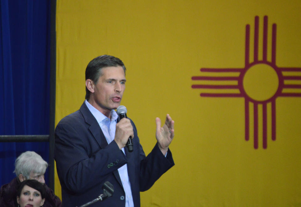 Incumbent Democratic Sen. Martin Heinrich of New Mexico speaks at a New Mexico Democratic rally in Albuquerque, N.M., on Monday, Nov. 5, 2018. New Mexico candidates for governor, a lone Senate seat and two open congressional districts barnstormed through major cities Monday to rally supporters in the wake of record-breaking early voter turnout. (AP Photo/Russell Contreras)