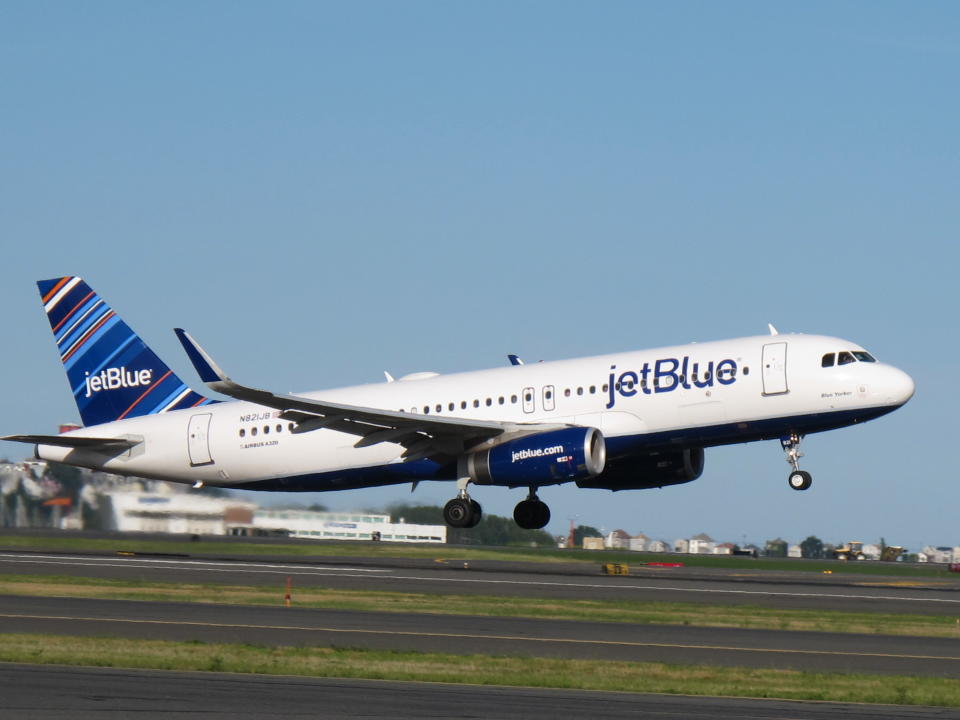 A JetBlue Airways plane about to land.