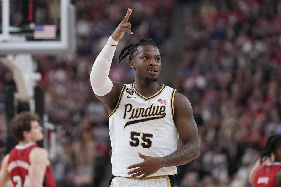 Purdue guard Lance Jones (55) celebrates a basket against NC State during the first half of the NCAA college basketball game at the Final Four, Saturday, April 6, 2024, in Glendale, Ariz. (AP Photo/Brynn Anderson )