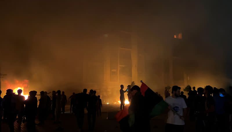 Protesters set fire to the Libyan parliament building after protests against the failure of the government in Tobruk