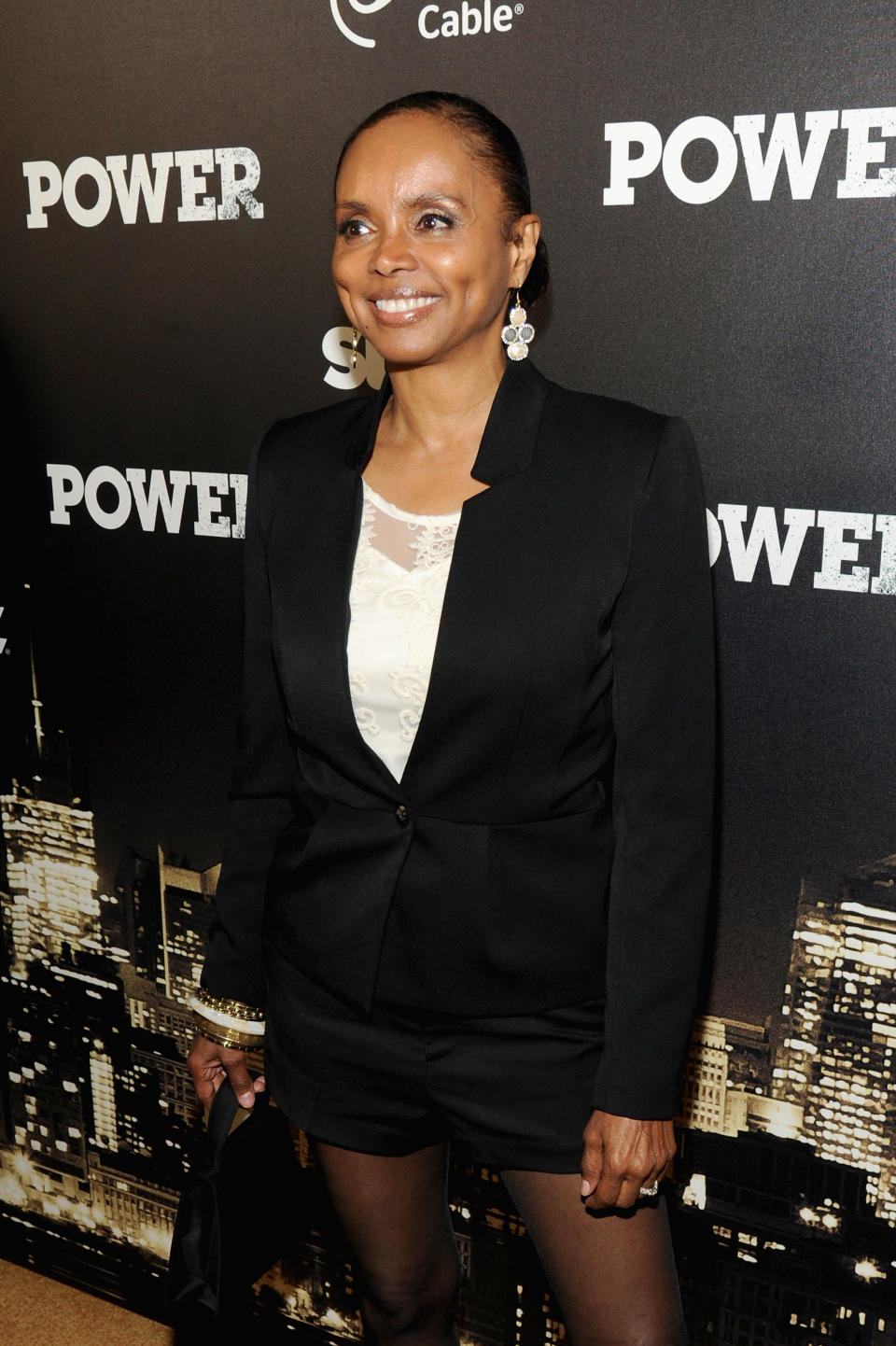 Debbi Morgan wearing all black.