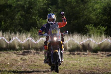 Dakar Rally - 2017 Paraguay-Bolivia-Argentina Dakar rally - 39th Dakar Edition - Twelfth stage from Rio Cuarto to Buenos Aires, Argentina - 14/01/17 - Sam Sunderland of Britain celebrates after finishing the special stage riding his KTM. REUTERS/Ricardo Moraes