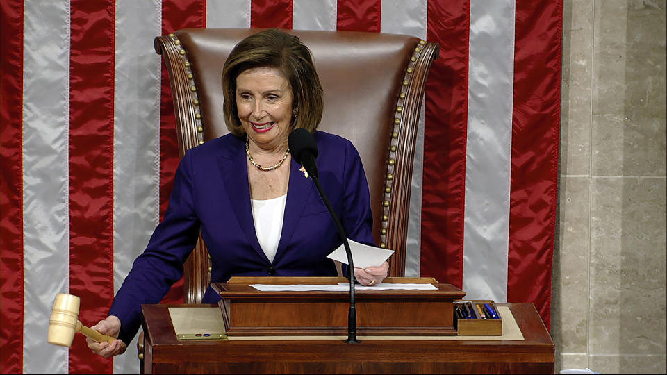 In this image from House Television, House Speaker Nancy Pelosi of Calif., announces final passage of the bill with protections for same-sex marriages, on the House Floor on Thursday, Dec. 8, 2022, in Washington. The bipartisan legislation, which passed 258-169, would also protect interracial unions by requiring states to recognize legal marriages regardless of "sex, race, ethnicity, or national origin."(Senate Television via AP)