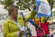 Germany's Green Party parliamentary faction co-leader Renate Kuenast (L) speaks during a support rally for the detained Moscow based feminist punk band Pussy Riot outside the Russian embassy in Berlin, August 17, 2012.