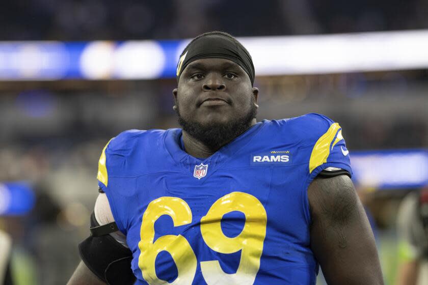 Los Angeles Rams guard Kevin Dotson (69) walks back to the locker room.