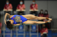 Shi Tingmao of China competes in women's diving 3m springboard semifinal at the Tokyo Aquatics Centre at the 2020 Summer Olympics, Saturday, July 31, 2021, in Tokyo, Japan. (AP Photo/Dmitri Lovetsky)