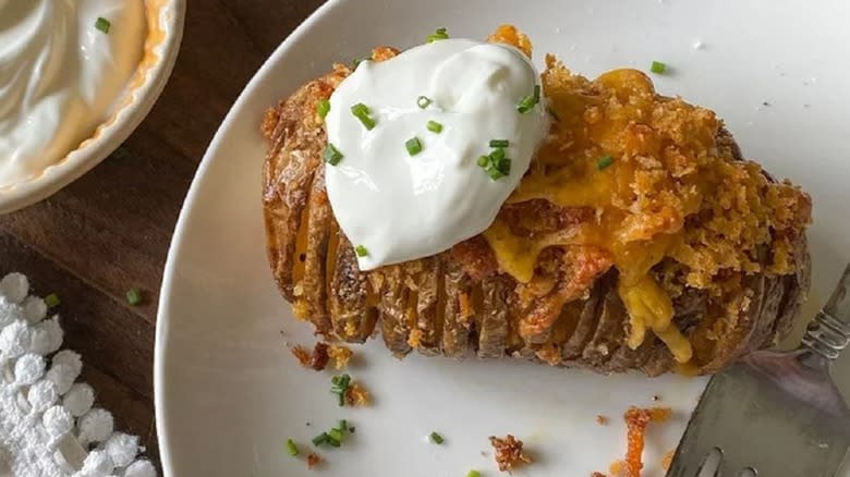 hasselback potato on plate