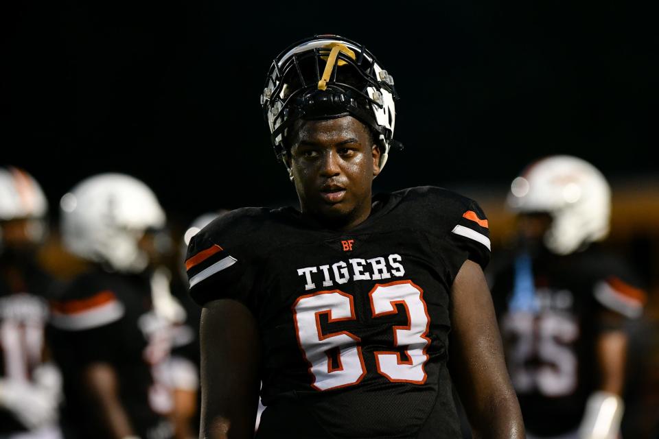 Beaver Falls' Sy'Mauri McCoy walks off the field during a water break at Reeves Field at Geneva College.