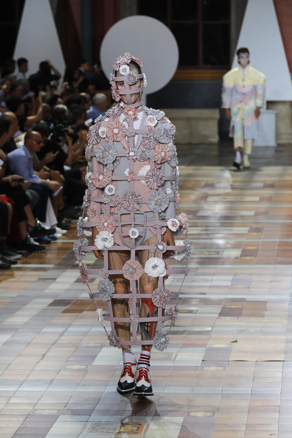 A model wears a creation for the Thom Browne mens Spring-Summer 2020 fashion collection presented in Paris, Saturday, June 22 2019. (AP Photo/Michel Euler)