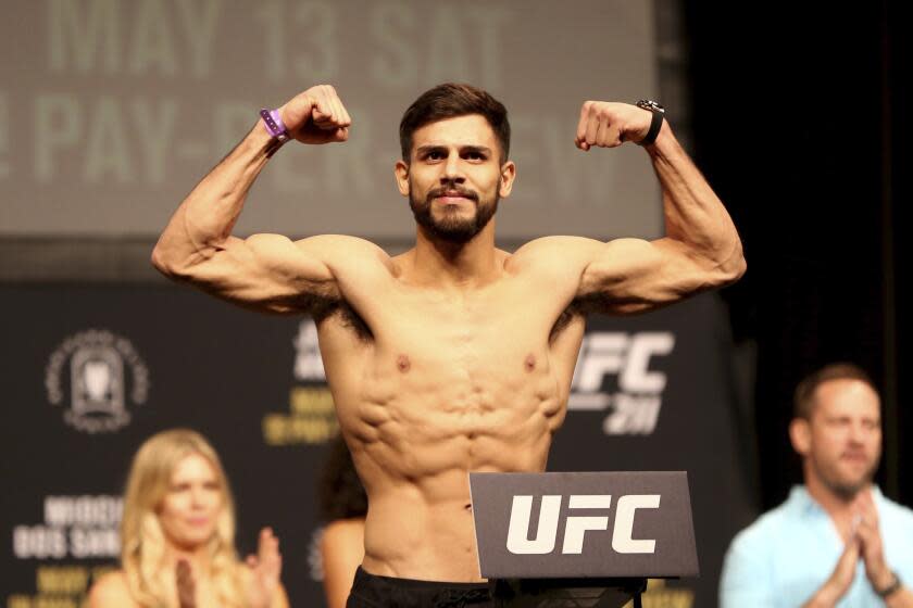 Yair Rodriguez poses for photographers during a weigh-in before UFC 211 on Friday, May 12, 2017, in Dallas before UFC 211. ( AP Photo/Gregory Payan)