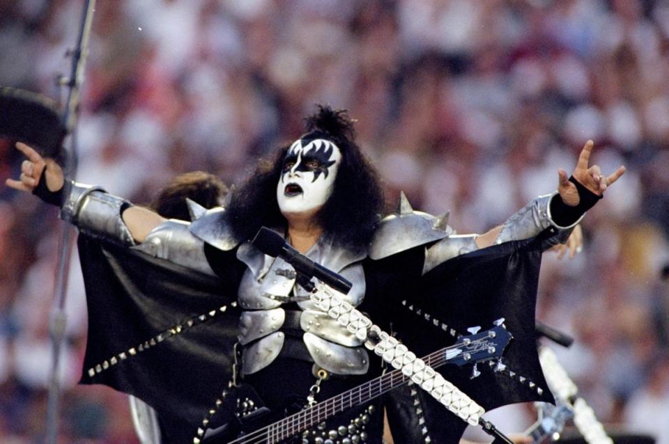 Miama, US, 1999: Gene Simmons performs ahead of Super Bowl XXXIII between the Denver Broncos and the Atlanta Falcons (Getty Images)