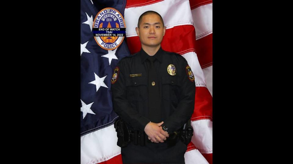 Grand Prairie police Officer Brandon Tsai died in the line of duty Monday night after his squad car hit a light pole during a chase with another vehicle, the police department said.
