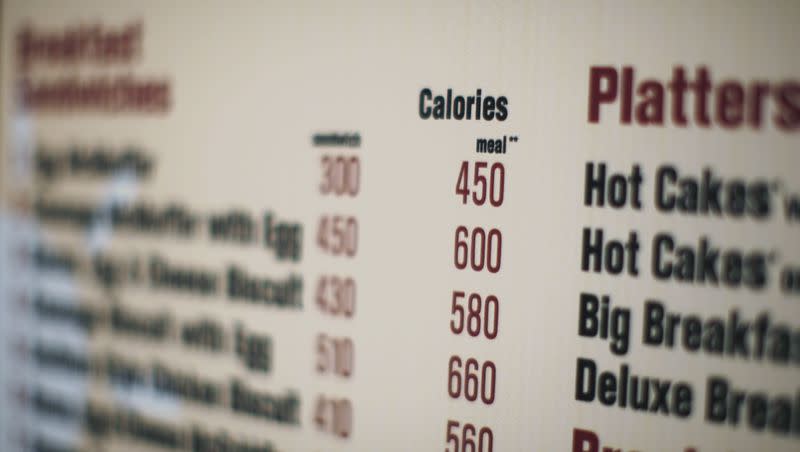 In this 2008 file photo, calories of each food item appear on a McDonalds drive-thru menu in New York. Do they help consumers make healthier choices?