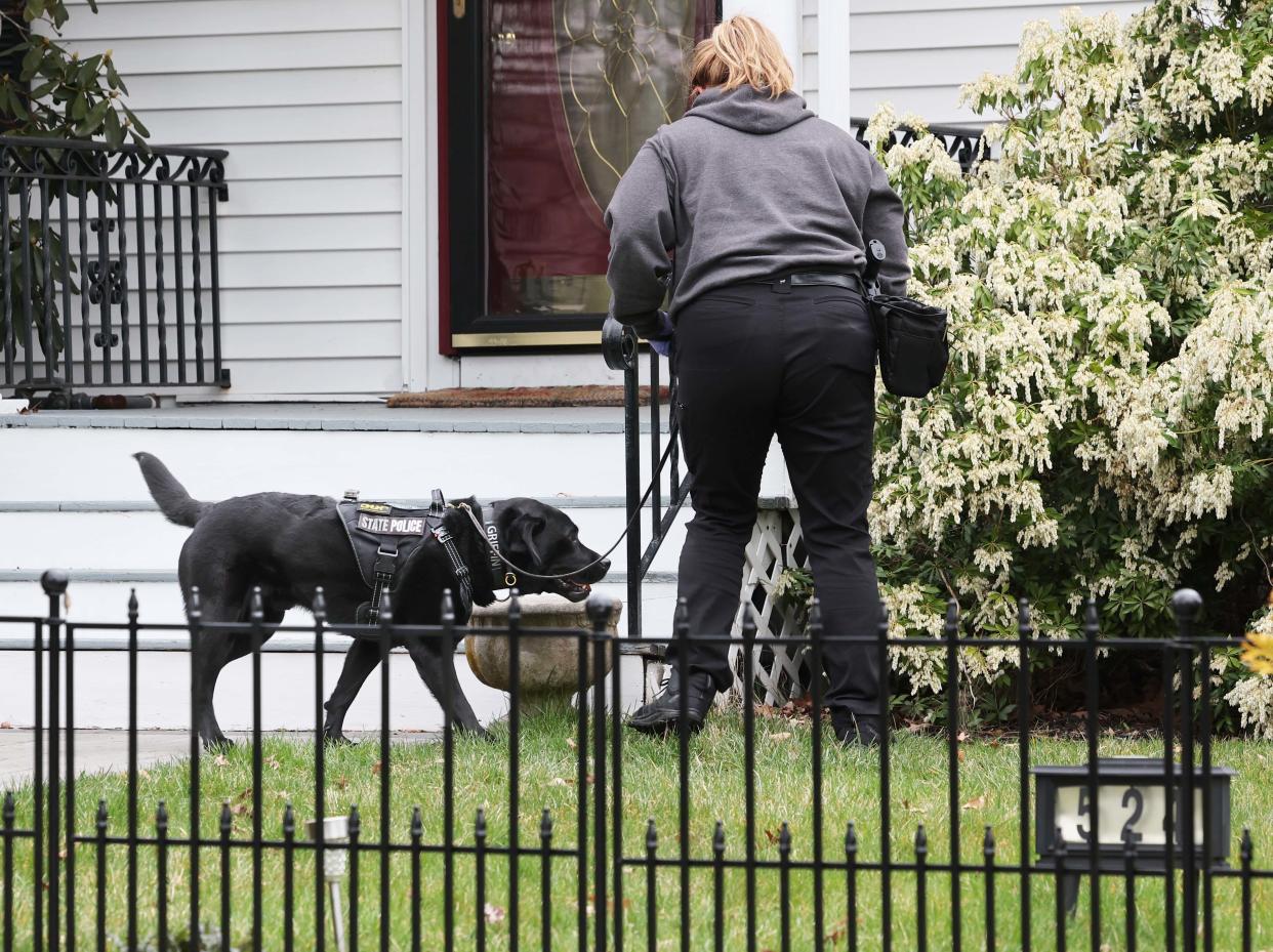 An investigation is underway outside 524 Ash St. in Brockton on Monday, April 2, 2024, following a double shooting investigators believe was a murder-suicide, the DA's office said.