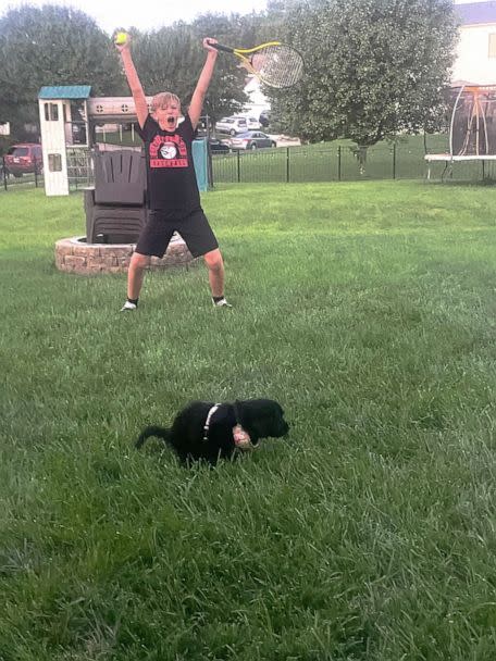 PHOTO: Adam celebrated when Weller the puppy relieved himself outside for the first time. (Courtesy of Sarah Grimpo)