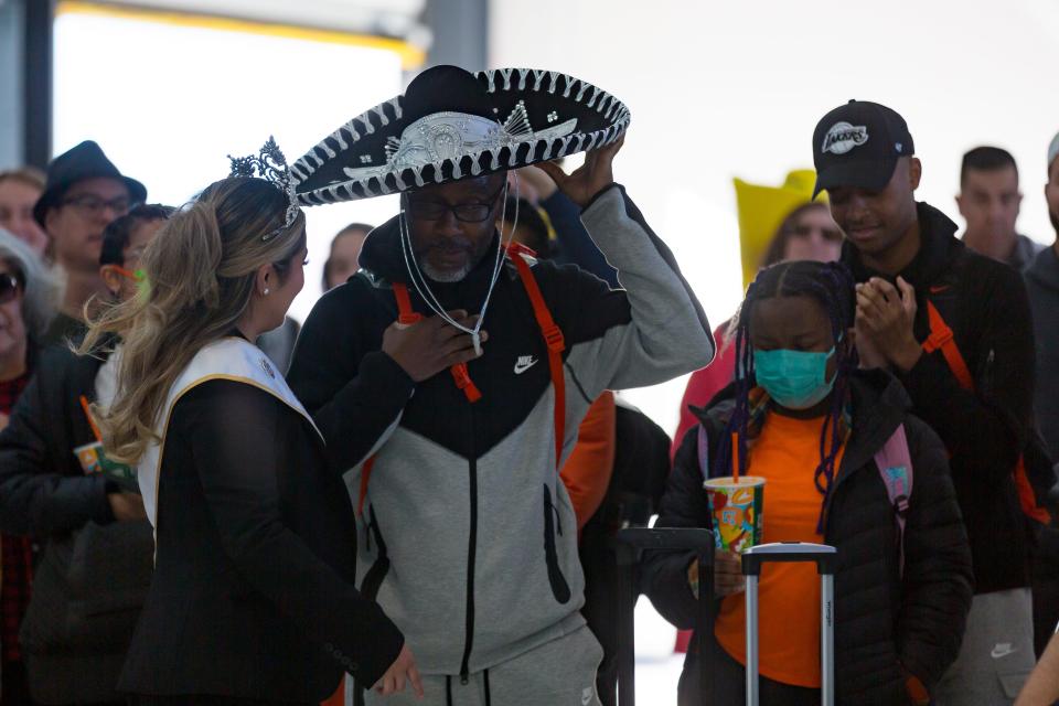 Oregon State football interim coach Kefense Hynson and his players arrive in El Paso Monday, Dec. 25, 2023, for the Tony the Tiger Sun Bowl.