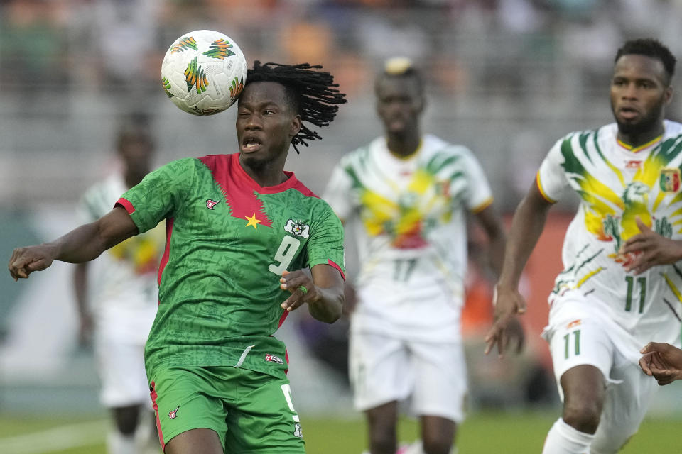 Burkina Faso's Issa Kabore controls the ball during the African Cup of Nations round of 16 soccer match between Mali and Burkina Faso, at the Amadou Gon Coulibaly stadium in Korhogo, Ivory Coast, Tuesday, Jan. 30, 2024. (AP Photo/Themba Hadebe)