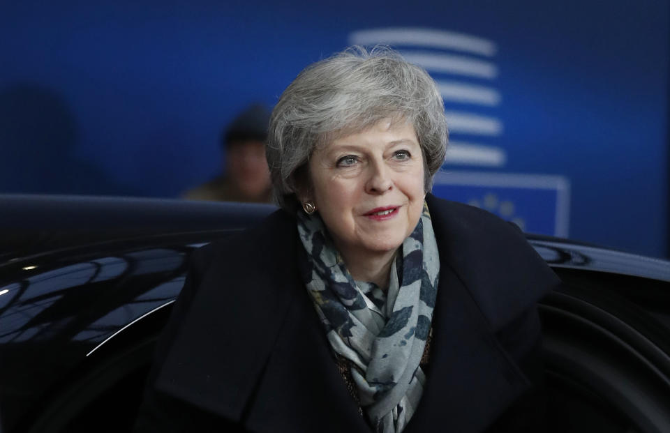 British Prime Minister Theresa May arrives for an EU summit in Brussels, Friday, Dec. 14, 2018. European Union leaders have offered Theresa May sympathy but no promises, as the British prime minister seeks a lifeline that could help her sell her Brexit divorce deal to a hostile U.K. Parliament. (AP Photo/Alastair Grant, Pool)